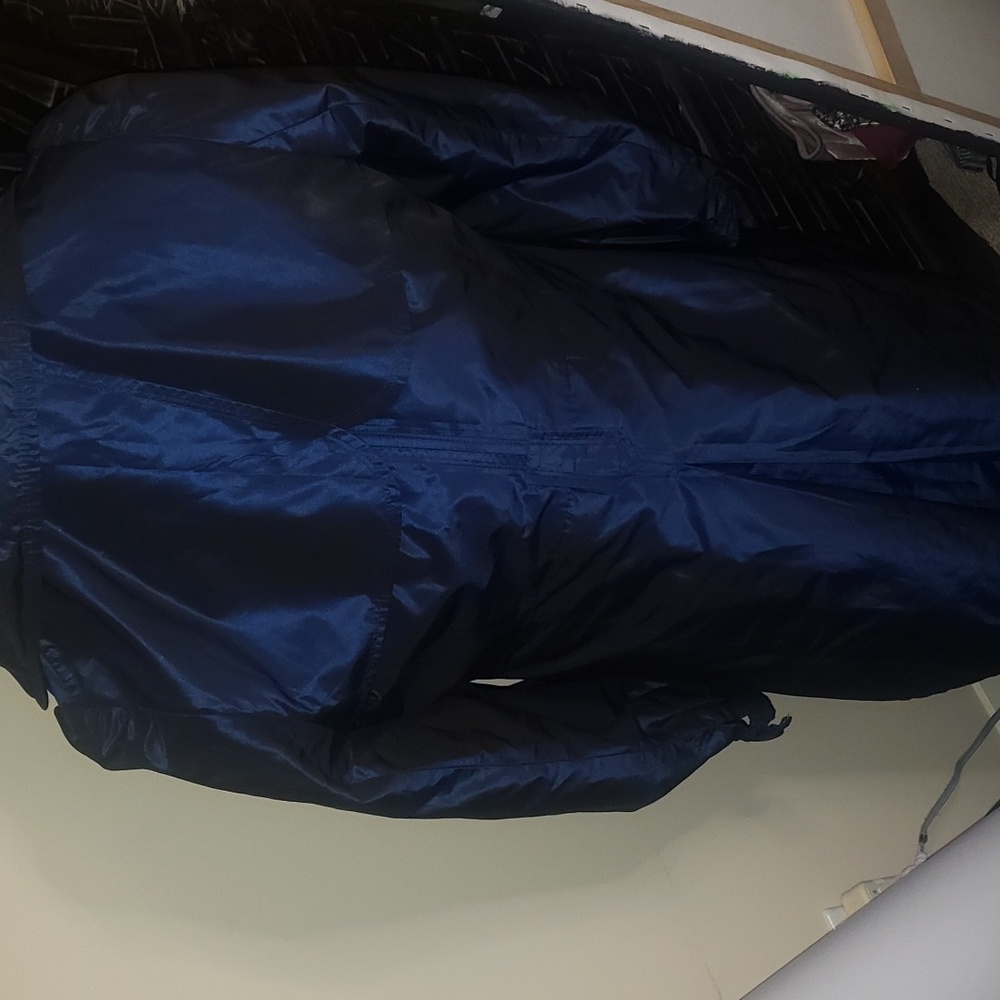 Two tone blue and black Alamode 27 jacket light changes effect of colours